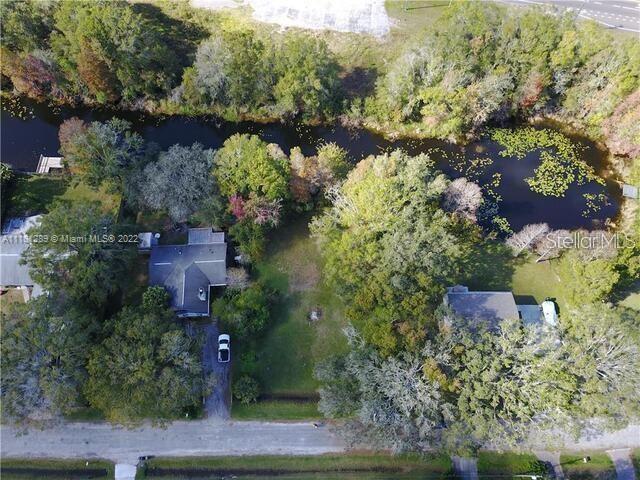 Prime Vacant Land with Canal Access to Green Lake! This incredible lot is in a fast-growing area, just South of 52 and 41 intersection, offering the perfect blend of convenience and freedom. With direct canal access to Green Lake, a boating and ski lake, you can enjoy endless days on the water. Unlike the nearby Lagoon communities of Angeline and Mirada, this property has no HOA and no CDD, meaning you can truly make it your own. With over 11,000 sq. ft. of space, there’s plenty of room to build your dream home and bring all your toys—boats, RVs, and more! Plus, impact fees are already paid, saving you time and money. Opportunities like this don’t come around often. Don’t miss your chance to own a piece of paradise! Sellers have the survey and can also provide documentation for the previously approved permits to build and permitted drawings!