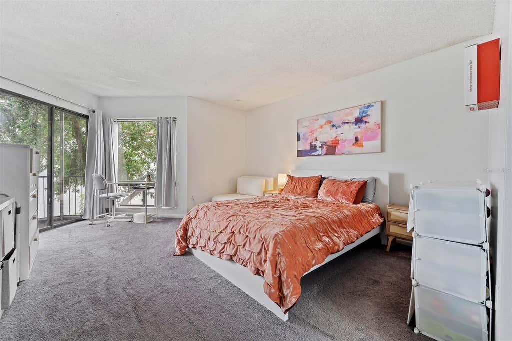 Photo of 4312 Lakeway Drive #12F, Orlando, FL 32839 (MLS # O6415177)