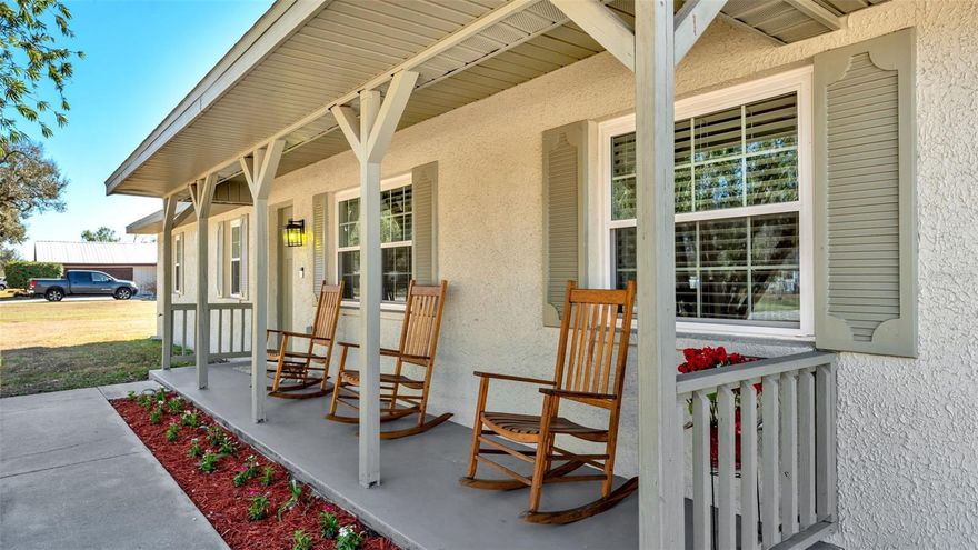 Under contract-accepting backup offers. This charming single-owner, ranch-style home offers the perfect blend of peace, quiet, and freedom in a convenient location in South Lakeland. Spanning a spacious .65-acre lot without an HOA, this home provides ample space and the freedom to live without restrictions. The welcoming front porch invites you to relax in a rocking chair with a glass of cold lemonade. As you enter, the foyer leads to a spacious formal space with living and dining rooms. The heart of the home is the kitchen and family room area, where loved ones gather and create cherished memories. The remodeled kitchen boasts tasteful updates, including granite countertops, white cabinetry, and a backsplash. You will appreciate the view of the backyard from your kitchen sink, and the breakfast bar overlooking the family room. Sliding doors from the family room provide access to the covered and screened back porch, offering additional outdoor living space for overflow seating and entertaining. The primary bedroom features an en-suite bathroom with a shower. There are two additional bedrooms and a guest bathroom with a shower and tub, as well. The interior laundry room has a convenient exterior door and access to the garage. Ample parking is available with a 2-car garage, a covered carport, and an extended driveway. The garage has a workshop space and there is a large shed with electricity in the backyard, providing ample storage, hobby space, and places for tinkering. This home is equipped with updated, efficient windows. Lakeland is a popular and rapidly growing area of Central Florida, conveniently located between Tampa and Orlando. This makes it an ideal location for commuters or anyone seeking easy access throughout the sunshine state. This home is ready for its next chapter and offers endless opportunities, both inside and out. Here you can enjoy the simple life – with a great piece of land and a wonderful place to call home!