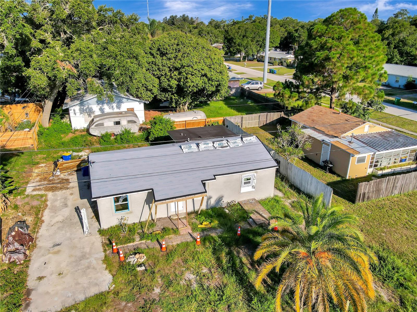 Calling all investors to this blank canvas ready to create your new home or rental investment. Renovations on this 3-bedroom, 1-bath residence in its final stages of completion, offering you the perfect opportunity to design all the essential finished and upgrades. Contemporary upgrades include, revitalization from top to bottom with all-new stucco, ensuring a fresh and appealing exterior that will stand the test of time. Enjoy peace of mind with brand new electrical, plumbing, and HVAC systems, and new windows. New HVAC ducts will enhance the airflow throughout the house, ensuring optimal temperature control and comfort throughout the year. There's plenty of room for a growing family or the flexibility to create a home office, or rental investment. The large windows in the living spaces and bedrooms flood the home with natural light, creating an inviting and vibrant atmosphere. The property boasts a generous yard, providing ample space for outdoor activities, gardening, and patio area. Seminole, FL, is known for its friendly community, convenient amenities, and proximity to stunning beaches, parks, shopping centers, and top-rated schools. Take advantage of this chance to add your personal touch and make this house your forever home or rental investment. Don't miss out on this fantastic opportunity! Contact us now to schedule a private tour and witness the captivating charm of this 3-bedroom, 1-bath gem.