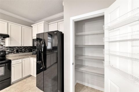 Tiny photo for 10002 SW 77th Loop, Ocala, FL 34481 (MLS # OM715310)