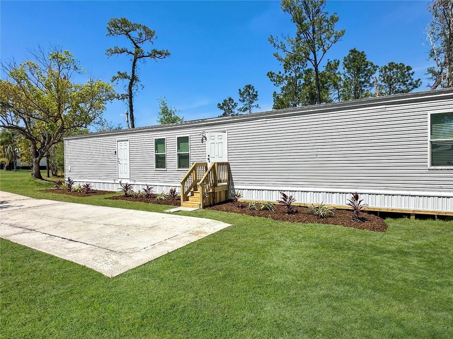 Welcome to this beautiful, manufactured home at the end of a quiet cul-de-sac, this 3-bedroom, 2-bathroom featuring an open-concept layout perfect for modern living. Enjoy a bright, airy interior with seamless flow between the kitchen, dining and living areas. The large backyard space offers a beautiful entertaining area for family and friends or simply relaxing outdoors after a long day. This home is located in a great location in Deland with easy access to local amenities, don't miss out on this perfect opportunity! Contact me to schedule a showing!