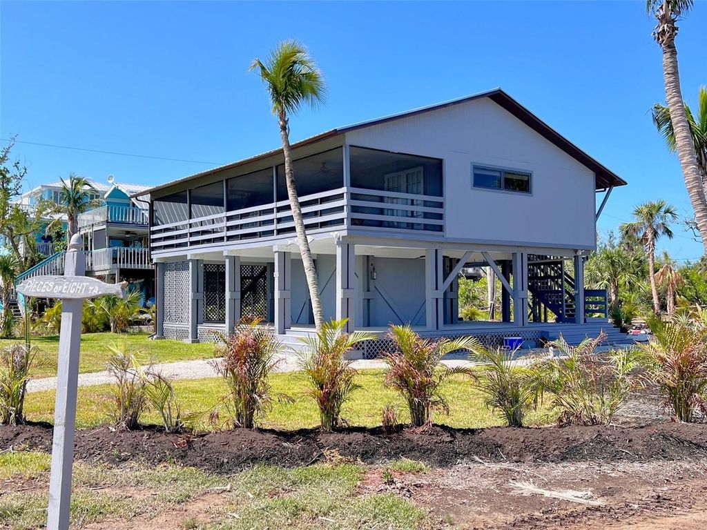 Photo of 9620 Pieces Of Eight Trail, Placida, FL 33946 (MLS # D6143830)