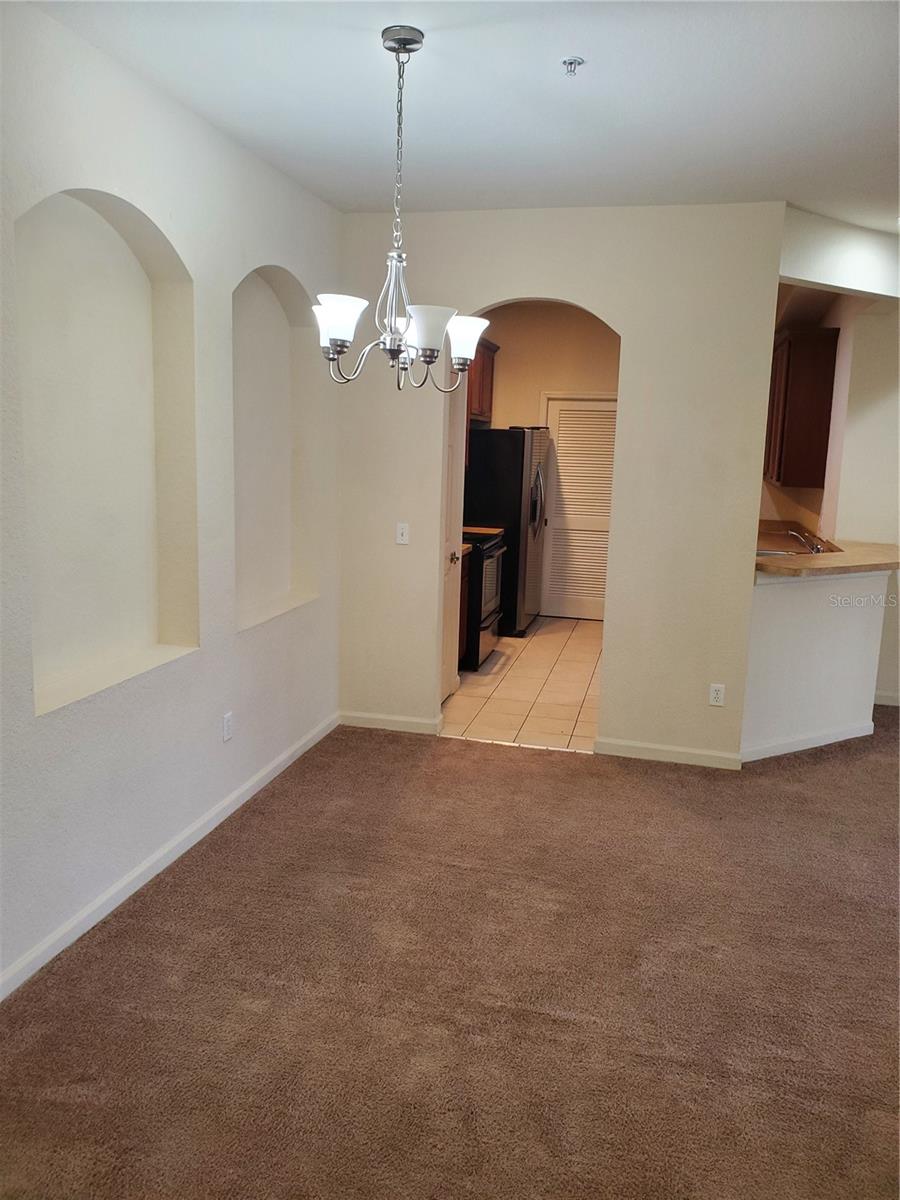 3rd floor Mediterranean inspired 3 bedrooms, 2 bath condo located in one of the most sought-after communities in Kissimmee!! It features foyer, living & dining areas tiled. Kitchen has closet pantry & breakfast bar with well-kept appliances. Master suite has a separate bonus room attached to it, walk-in closet, dual sinks, w standalone shower. Inside laundry hook-up with full size washer/dryer and screen enclosed balcony. Flora Ridge is a Gated community w many amenities like pool and playground area. Close to shopping, dining, schools, major roadways, area attractions, & Int. Airport. Come live the Flora Ridge lifestyle!!