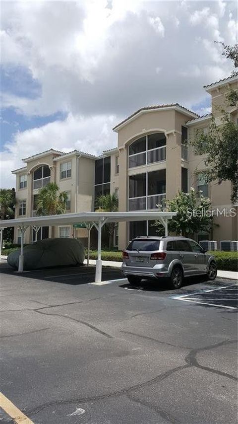 Photo of 3000 Laurel Park Lane #302, Kissimmee, FL 34741 (MLS # S5132461)