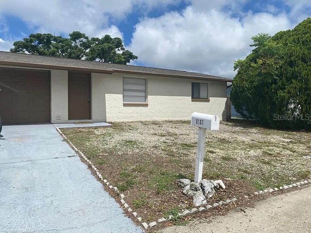 Photo of 9101 Gray Fox Lane, Port Richey, FL 34668 (MLS # TB8459745)