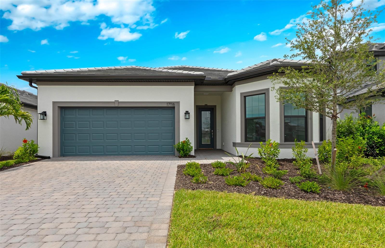 One or more photo(s) has been virtually staged. New construction Prestige plan, available now a Lakespur at Wellen Park! This new construction, 2 bed 2.5 bath home offers an efficient single-story layout with great flow from room to room. The centrally located kitchen lets you enjoy casual breakfasts in the café or sunlit extended covered lanai. The flex room can serve as a den, home office, or third bedroom. The open-concept layout seamlessly connects the living room, cafe, and kitchen, making it perfect for entertaining guests or enjoying cozy evenings at home. Upgrades include built in kitchen appliances, large walk in shower in the owners suite, tray ceiling in the owners suite and gathering room, upgraded cabinetry and quartz countertops, 8' interior doors, and much more. Beyond your doorstep, Arbor Oaks provides an array of resort-style amenities. Spend sunny afternoons at the pool with lap lanes and spa, unwind at the Barefoot Bar, or gather with friends by the Firepit Grill. The state-of-the-art clubhouse features a fitness center, community room, catering kitchen, activity rooms, and an outdoor veranda. Enjoy friendly competition on the pickleball, bocce ball, and tennis courts, or host a cookout at the BBQ grills. Your four-legged companion will love the community dog park, and for beach lovers, pristine destinations like Stump Pass State Park and Siesta Key are just a short drive away. Experience the best of Florida living at Arbor Oaks—your dream home awaits!