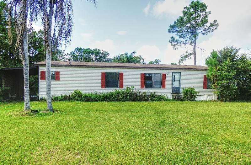 Photo of 115 Lake Caloosa Landing, Frostproof, FL 33843 (MLS # K4903678)