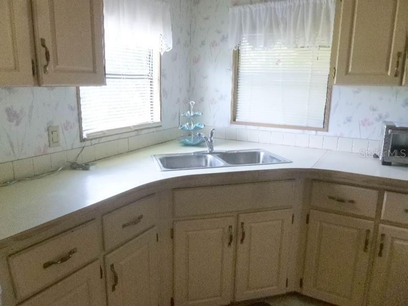 Photo of 115 Lake Caloosa Landing, Frostproof, FL 33843 (MLS # K4903678)