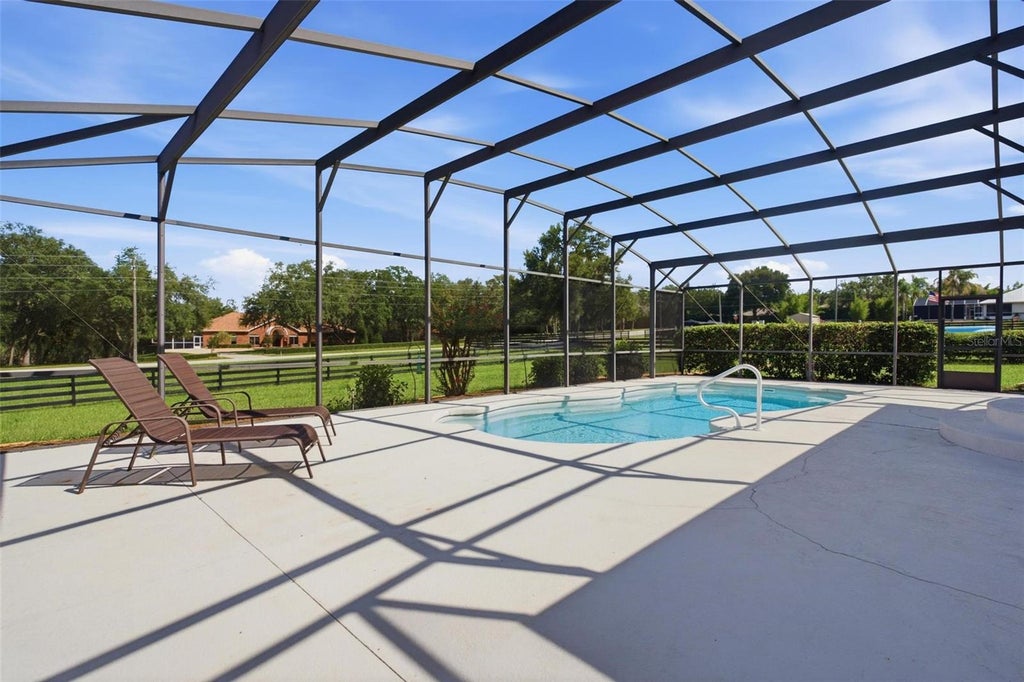Photo of 40044 Agusta Drive, Lady Lake, FL 32159 (MLS # G5117298)
