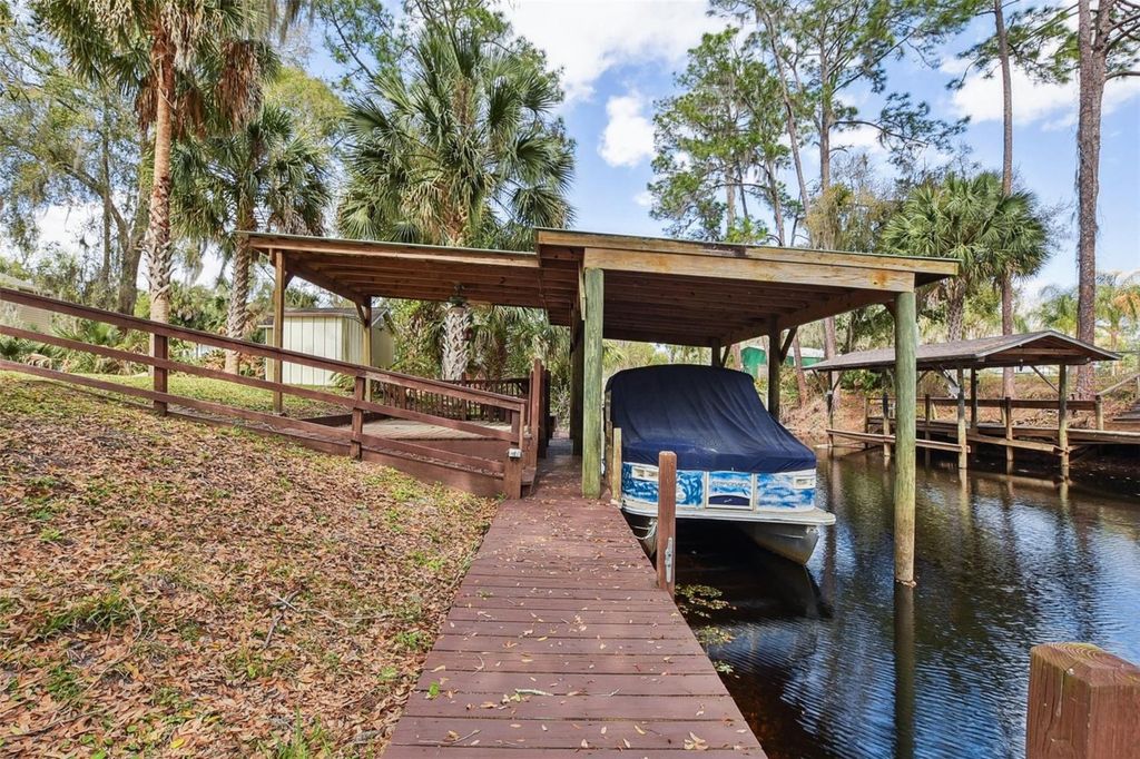 Photo of 2215 Hontoon Rd. Road, Deland, FL 32720 (MLS # O6387962)
