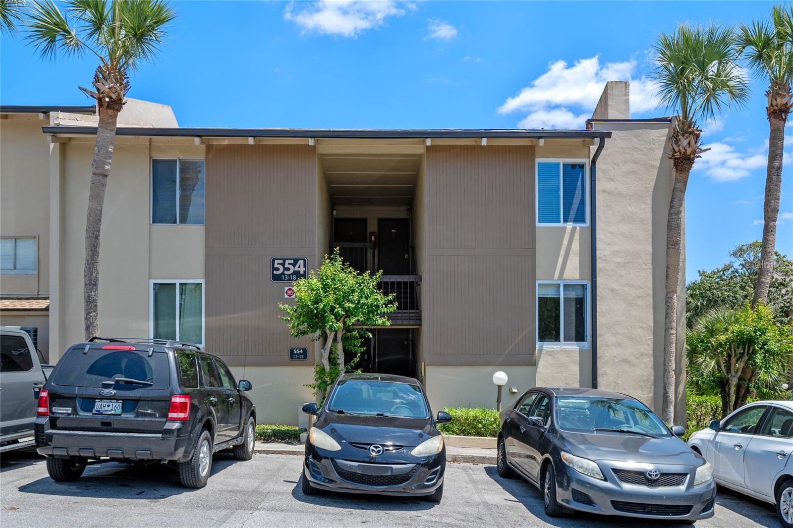 Discover your new home in the heart of Altamonte Springs! This move-in ready condo is nestled within the picturesque Sandy Cove community, offering breathtaking lakefront views and direct access to the serene Lake Orienta. Situated on the 2nd floor, this turnkey unit boasts brand new vinyl plank flooring throughout the main living areas and fresh interior paint in a chic, modern gray. The generous bedroom comfortably fits a king-size bed, features brand new carpet, and offers ample storage with a large walk-in closet. Equipped with a new water heater (2024) and an updated electrical panel for peace of mind. Sandy Cove residents enjoy tranquil waterfront living with easy access to Publix, Whole Foods, Starbucks, Altamonte Mall, Uptown Altamonte, AdventHealth, and more. Just minutes from I-4, making downtown Orlando a quick 15-minute drive. Relish in two sparkling swimming pools surrounded by lush tropical landscaping, lakefront tennis courts, beach volleyball, and a community boat ramp. Whether you enjoy a sunset cruise, boating, or kayaking around the pristine Lake Orienta, Sandy Cove offers more than just a home—it's a lifestyle. Experience peaceful lakefront living with all the conveniences of city life at your doorstep. *Prospective tenants must be approved by the condominium association prior to occupancy*