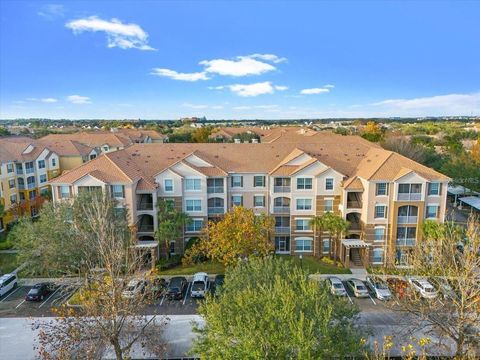 Photo of 3332 Robert Trent Jones Dr #40503, Orlando, FL 32835 (MLS # O6369102)