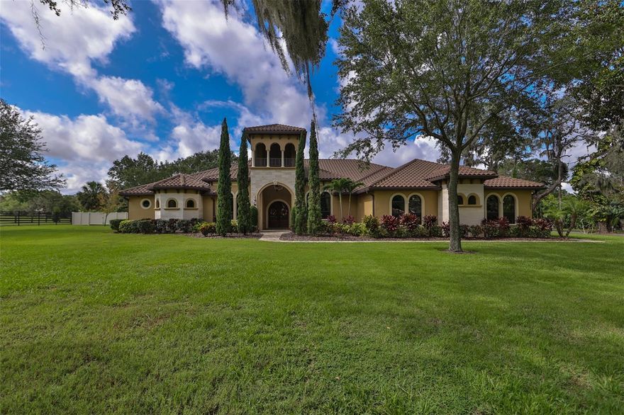 Under contract-accepting backup offers. Proof of funds or Pre-Approval required prior to showing, You will fall in love with this Custom Mediterranean Estate on 2.7 acres. Must see, private gated driveway Property totally fenced. Beautiful oak trees. Non subdivision No Deed restrictions No Hoa!!! This custom home is very open with large rooms with walk in closets.  Separate office,  Beautiful salt water solar heated 17'x35' pool with jacuzzi, fountains, water spill overs and fire bowls. For the business person, you would have the privacy you need in the 2400 sq ft. office/shop/gym in separate building behind the residence on the back of the property. Also could be used for the collector of car's antiques or hobbyist. Plenty of room for the motorhome, garden, tree house, many choices here. The main home also has oversized 3 car garage. 2 Tankless water heaters, 2.74 Ac's, circle driveway, paver sidewalks, surround sound including pool and lanai area. This quiet private estate is 15 minutes to Tampa or 45 minutes to Orlando. Great school's