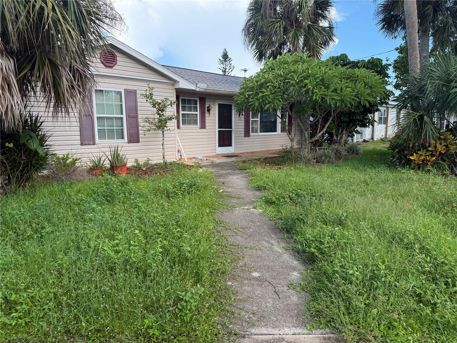Short Sale. BANK APPROVAL REQUIRED - Set your course for this rare waterfront gem offering deep sailboat water with no fixed bridges and direct access to Charlotte Harbor. From your backyard, cruise to Boca Grande Pass in about an hour and discover some of the finest sailing and fishing on Florida’s Gulf Coast.
This home is designed with boaters in mind—watch your sailboat from the French doors of your primary suite, ready for your next voyage. An oversized carport is perfect for gatherings or gear storage, while a spacious 560 sq ft outbuilding easily accommodates vehicles, tools, or even a trailered boat.
Inside, the open layout connects to a breezy screened lanai—ideal for relaxing after a day on the water. A private office/den with exterior entry provides flexibility for guests or a home business.
Set along the scenic Myakka River and teeming with native birds, this is coastal living at its best—affordable, peaceful, and full of adventure.