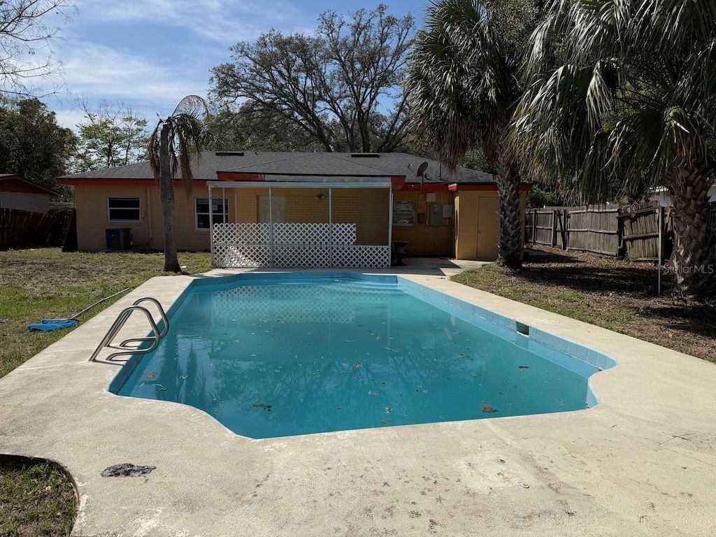 Photo of 4213 Seybold Avenue, Orlando, FL 32808 (MLS # O6394449)