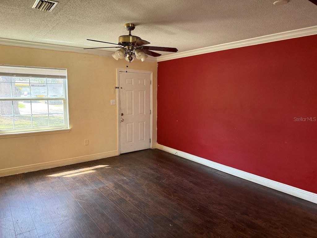 Photo of 4213 Seybold Avenue, Orlando, FL 32808 (MLS # O6394449)