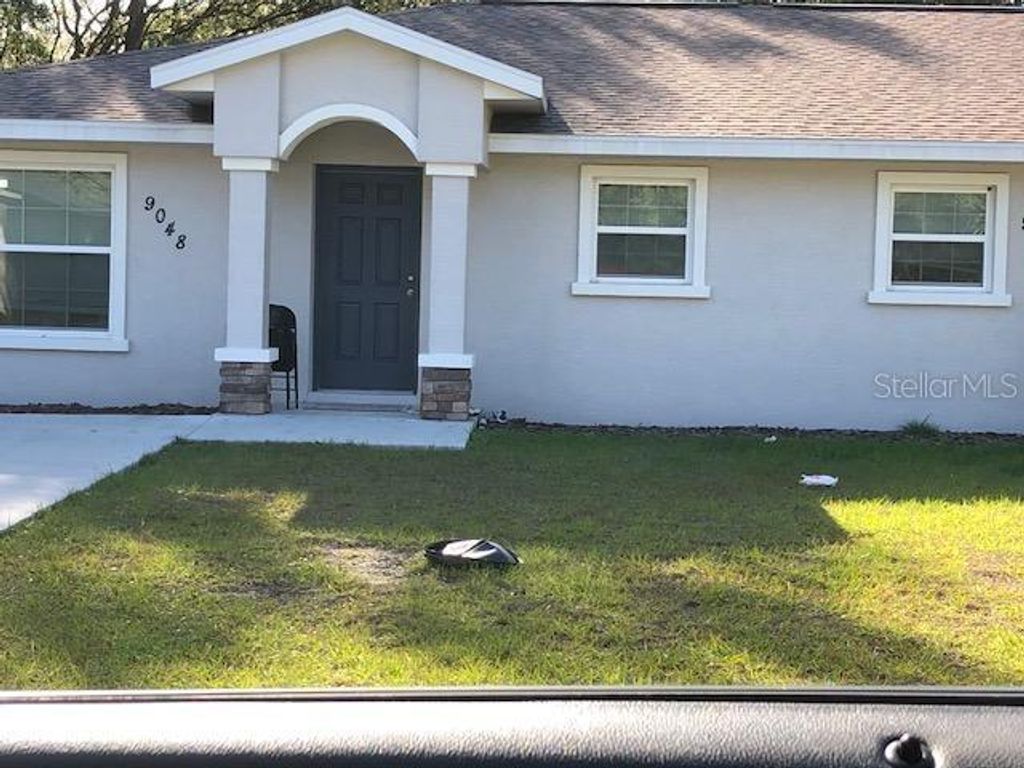 Photo of 9048 N Travis Drive, Citrus Springs, FL 34434 (MLS # OM723326)