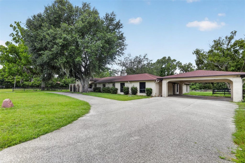 Photo of 120 Creek Crossing Road, Port Orange, FL 32128 (MLS # O6425197)