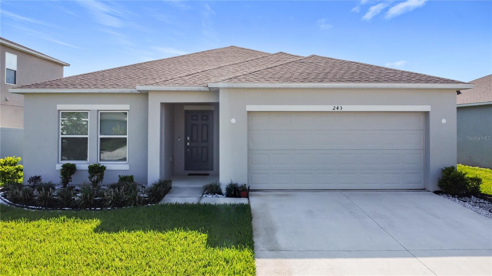 Welcome to this WELL MAINTAINED Magnolia Model in the popular community called STEPPING STONE. Notice the well groomed LANDSCAPING. This bright and spacious home was built in 2023 but shows as a new home. This MOVE-IN ready home highlights 2,106 square feet of living space which includes four bedrooms, three bathrooms, a kitchen, dining area, great room, and two car GARAGE. The extended entertaining corridor includes the dining area, kitchen, and great room, with sliders opening to the back patio. There is 18X18 inch CERAMIC TILE throughout except the bedrooms have CARPET. The KITCHEN features a huge BAR/ISLAND, ample counter space, Corian Counters, newer Stainless Steel APPLIANCES, and a spacious PANTRY. The Primary BEDROOM which is tucked quietly into the back of the home has carpet, blinds on the window, and a WALK-IN Closet. Enjoy the large shower enclosure in the PRIMARY Bathroom. The three other BEDROOMS boast Carpet, Window Shades, and a Closet. The HALLWAY also has a closet. The LAUNDRY ROOM has a NEWER Washer and Dryer which are included in the sale. A two car garage is another element of this WONDERFUL home. This home is perfect for a growing family or entertaining guests. Conveniently located near schools, and stores. **See the FULL LENGTH VIDEO on Tour Link 1.** MAKE THIS HOME YOURS TODAY