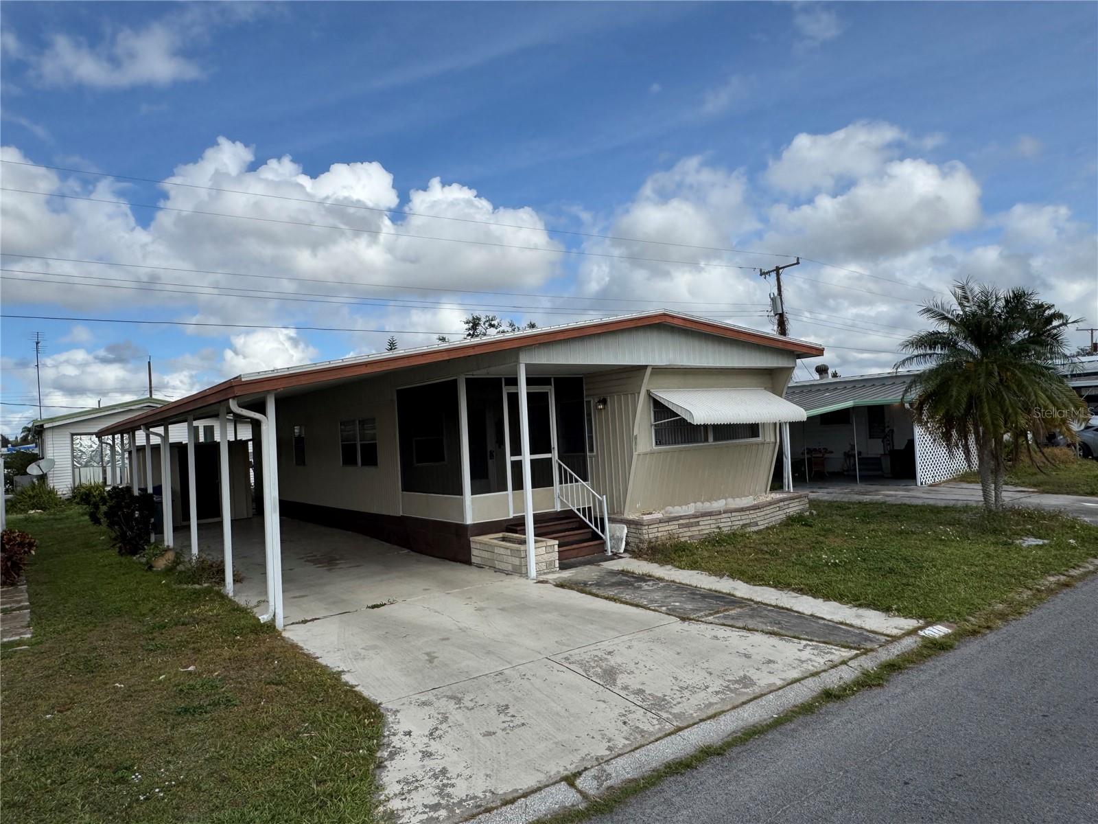 Now just $80,000!?This 2 Bedroom / 2 Bath manufactured home in the sought-after 55+ community of Fair Lane Acres offers the perfect opportunity for snowbirds, downsizers, or investors looking to renovate. With a newer roof, solid bones, and great layout—including a screened-in lanai and large carport—you can update at your own pace while enjoying community perks.
Community Amenities Include:
• Sparkling pool
• Shuffleboard & pickleball
• Active social events
• Pet-friendly environment
Conveniently located near SR 70, US 301, shopping, dining, and medical facilities—with easy access to the Sarasota-Bradenton Airport. HOA is only $131/month and includes lawn care!
Cash or conventional only. Property sold AS-IS. Don't miss your chance to own a piece of paradise and build instant equity.