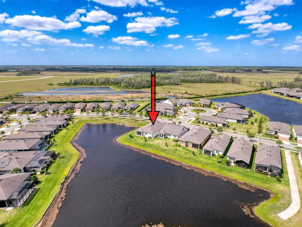 Photo of 18743 Coastal Shore Terrace, Land O Lakes, FL 34638 (MLS # W7876648)