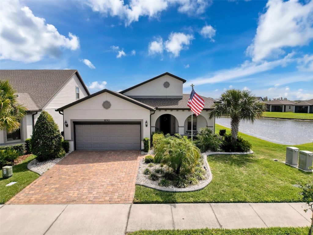 Photo of 18743 Coastal Shore Terrace, Land O Lakes, FL 34638 (MLS # W7876648)