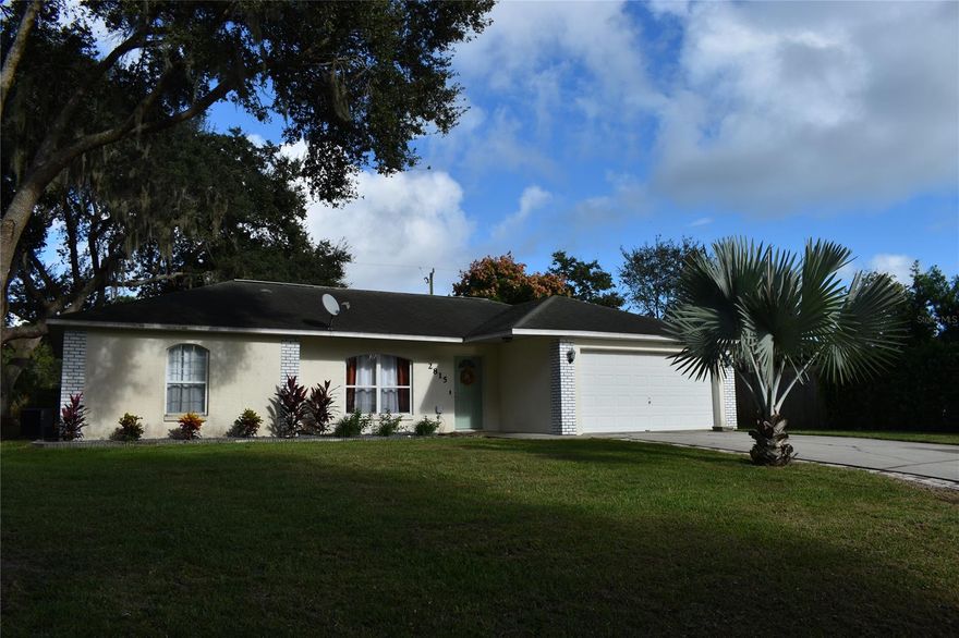 Mature landscaping makes the curb appeal of this home stand out! Spacious home features 3 bedrooms, 2 baths, Master with walk-in closet, en-suite bath and laundry, large family room, kitchen with dining area and 2-car oversized garage. Relax on the screened back porch overlooking the large, fenced back yard with oaks for plenty of shade. Beautiful flooring, new carpet, HVAC 2015, Storm Shutters, Rainbird Irrigation System. Great neighborhood, close to shopping and the beach. ;Water: City