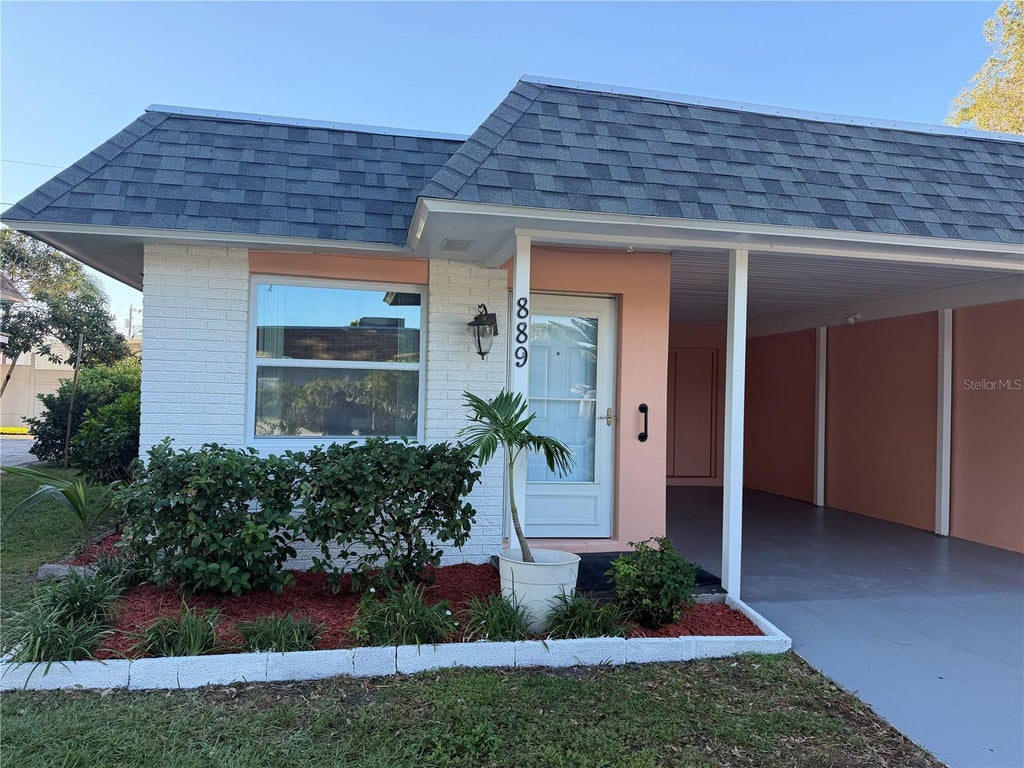 Photo of 889 Sky Loch Drive S, Dunedin, FL 34698 (MLS # TB8559087)