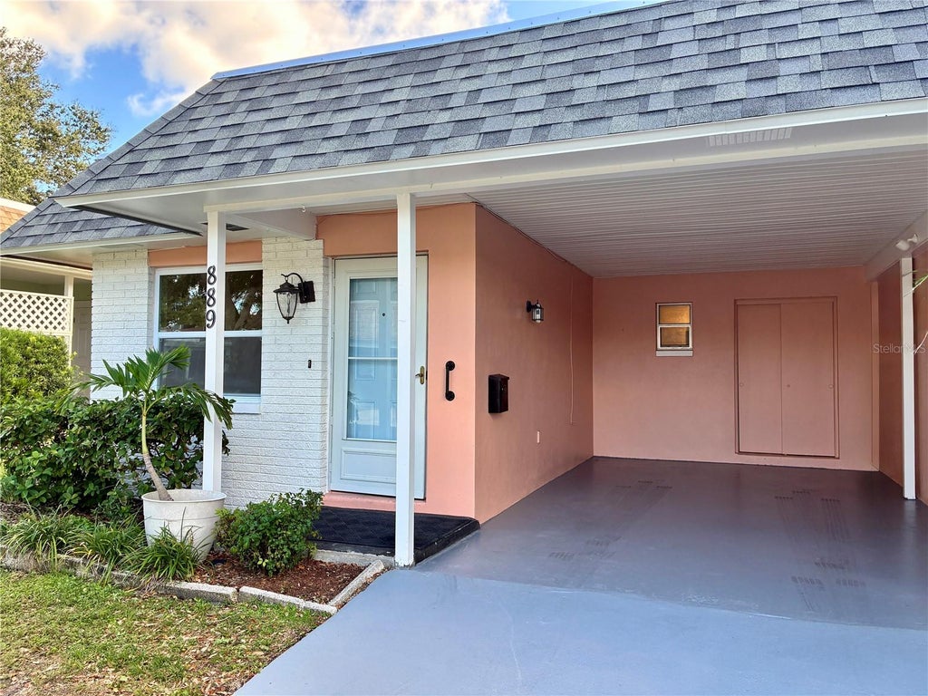 Photo of 889 Sky Loch Drive S, Dunedin, FL 34698 (MLS # TB8559087)