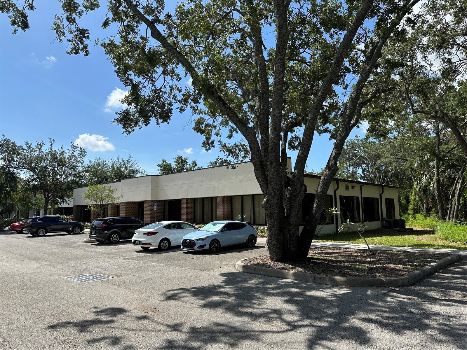 This 12,246± SF office/warehouse property is available for sale or lease and offers flexibility for both investors and owner-occupants. Suite A, totaling approximately 6,304 SF, is currently available and ideal for an owner-user, with the potential to add an overhead (OH) door to increase functionality. Suite B, 5,942 SF, includes a small warehouse component with an existing OH door and is occupied by a long term tenant. Both suites feature spacious conference rooms, breakrooms, multiple sets of restrooms, and high-quality office finishes, including oversized hurricane-rated windows. The property also offers 43 parking spaces and enjoys a central location with quick access to the Suncoast Parkway.