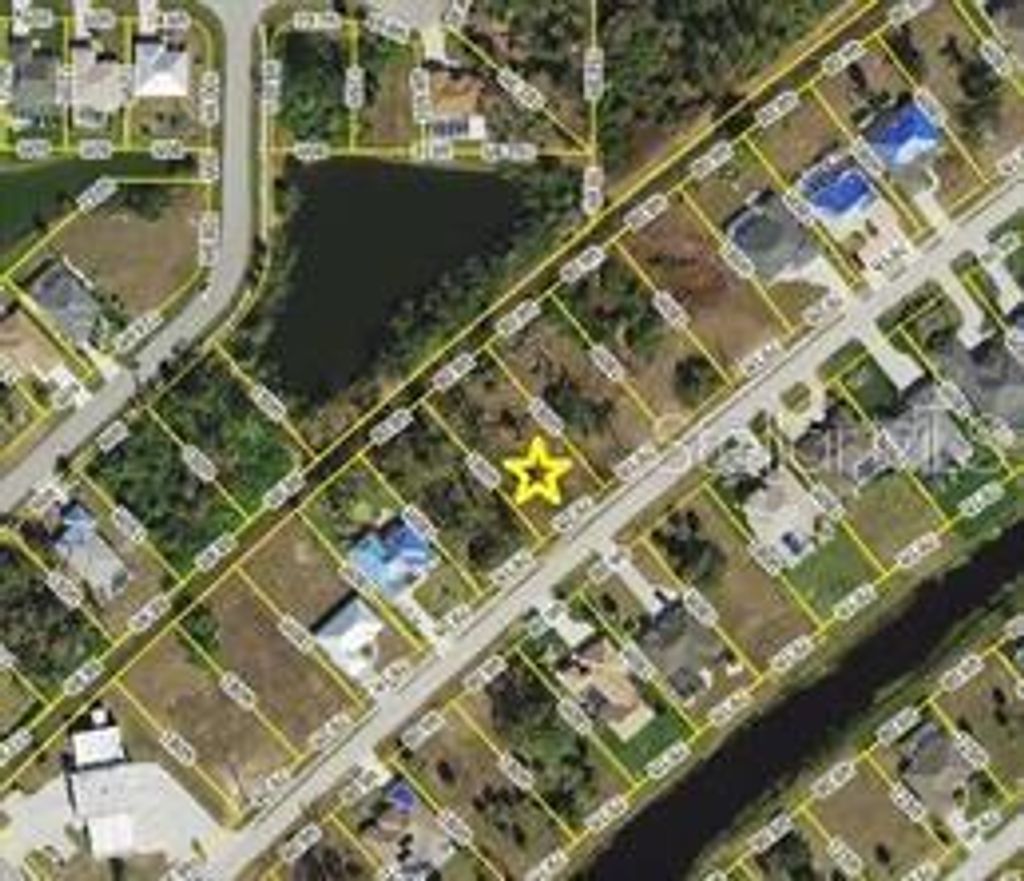 Photo of 415 Boundary Boulevard, Rotonda West, FL 33947 (MLS # D6144743)