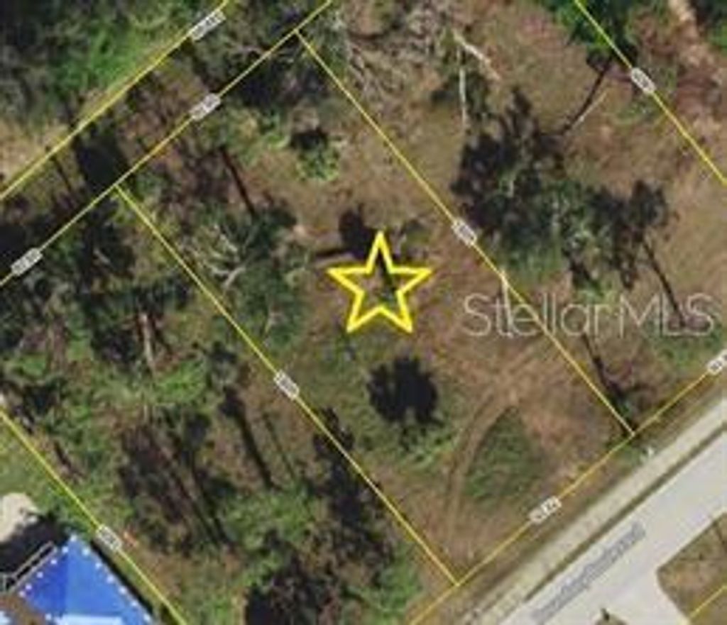 Photo of 415 Boundary Boulevard, Rotonda West, FL 33947 (MLS # D6144743)