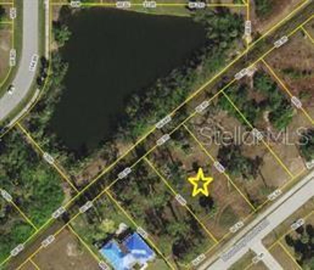 Photo of 415 Boundary Boulevard, Rotonda West, FL 33947 (MLS # D6144743)