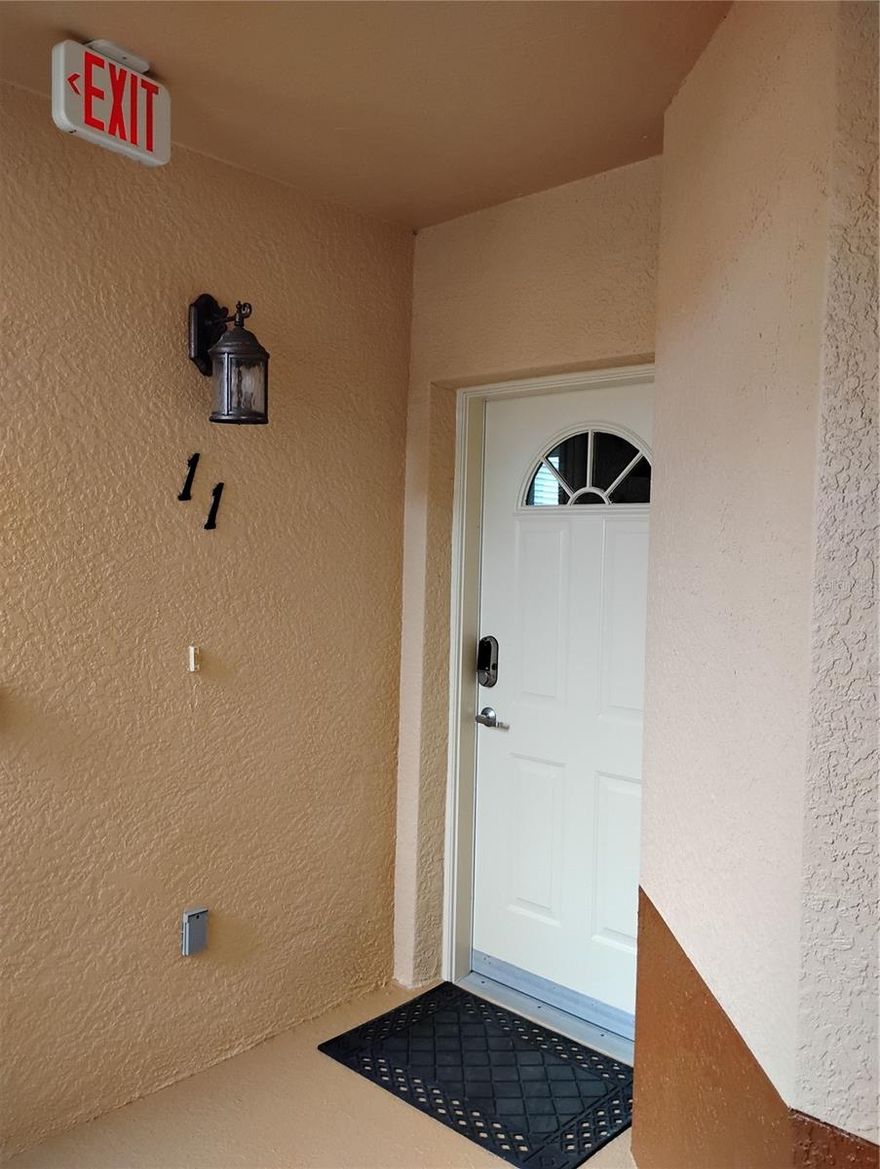 WOW!! Check out this beautiful first floor end unit Condo with views of the heated community pool and clubhouse. The location is so convenient to everything in Venice and the surrounding area. Just off East Venice Ave, your are less than 10 minutes from the best beaches in Southwest Florida, Venice Island and all the great shops and restaurants, 3 miles to I-75 with access to the entire state and Sarasota only 20 minutes away. A true 3 bedroom, split plan with a lovely great room open kitchen and dining area overlooking the lake. Each bedroom offers privacy, nice closets and window treatments. The first of three bedrooms, as you enter the unit was used as media room wired for surround sound. The second of three is down another hall offering more privacy, just off that hall is your main bath with a rain shower head, a full linen closet with plenty of room for guests and family. The master is just off the kitchen area featuring a pocket door, no wasted space, large with a view of the lake. Enjoy the oversized master bath, featuring a full walk in closet with built in shoe rack, a second standard closet, double sink vanity, large shower with built in seat, private water closet. All with pocket doors, saving the floor space. The great room features include a recessed area b=perfect for a Large TV or sitting nook, a breakfast bar and direct access to a wonderful lanai, fully screened with exit door leading to the pool, almost feels like it's your own. Room for a 4 seat patio set and table and a great view of the lake. The exterior was recently painted, March 2026 by the HOA, no special assessments and it looks amazing. The kitchen is a chef's dream with all new appliances, Microwave have never been used, still has the packing tape on it. Large side by side and beautiful stove. Lots of cabinets and the crown jewels include a Pot rack light above breakfast bar, a full pantry closet, large enough for your extra appliances and food, no need to leave them on the counter. The inside laundry has an extra bonus area that the seller used as an office. Large enough for a full side execute desk, file cabinet and addition storage. Laundry room includes Maytag washer and dryer, storage and the new H2O Heater, replaced in March 2026/ Outside you will find a full 1 car garage with a automatic open, belt just replaced April 2026, great to store your car if you are only here part time. Room for storing your beach chairs and floaties too. Don't miss this unit, it will not last at this price, some furnishing may convey or they can be removed, buyers choice.