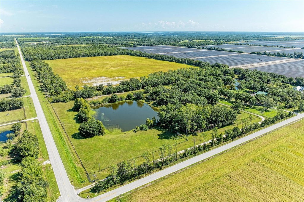 Photo of 6055 County Road 675, Myakka City, FL 34251 (MLS # A4704004)