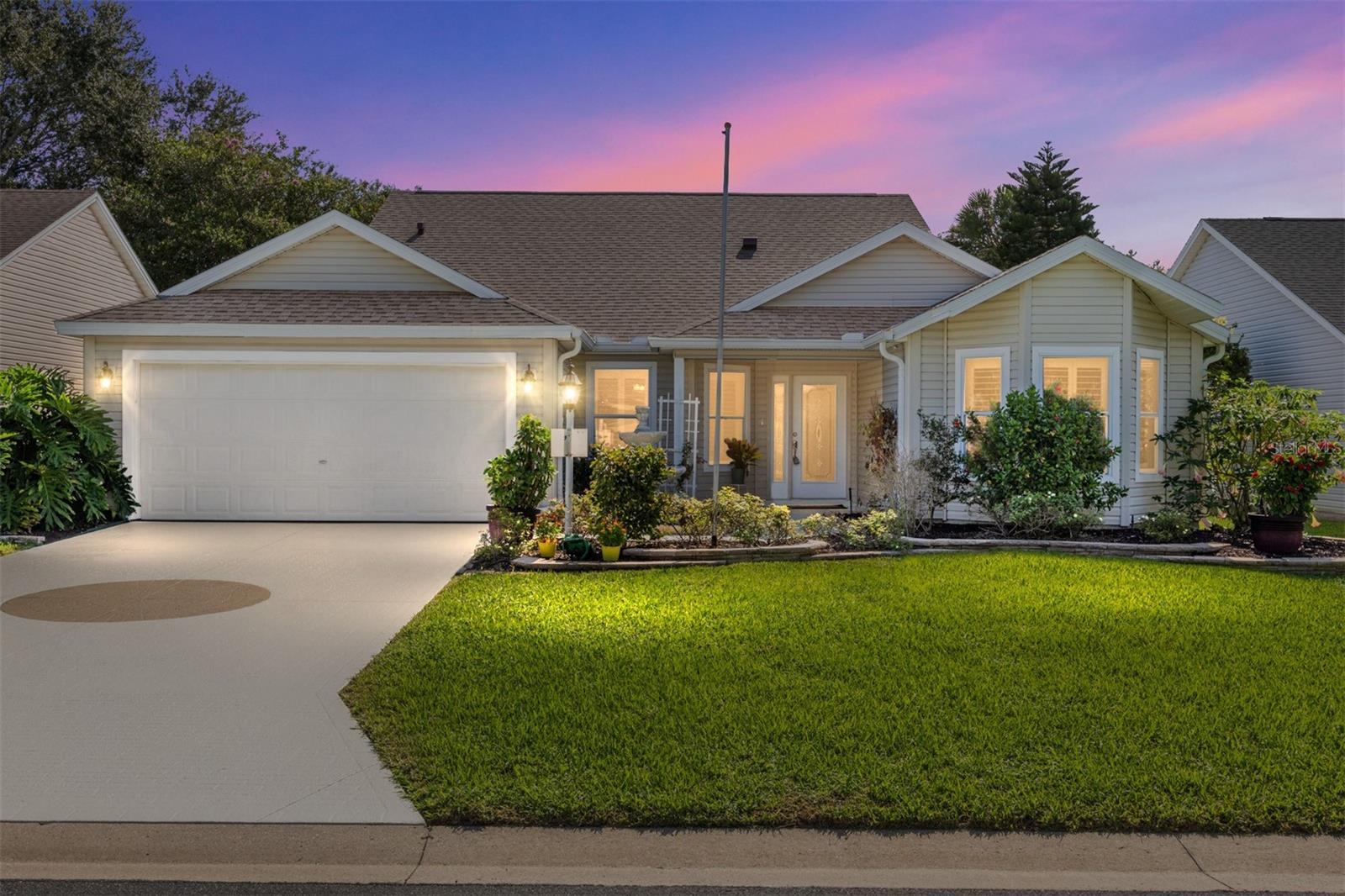 One or more photo(s) has been virtually staged. Bond Paid! Discover this immaculate 3-bedroom, 2-bathroom Camellia Designer Home in the quiet Village of Glenbrook (1968 sq-ft, 2660 sq-ft with glass/screened patio and garage). Enjoy peace of mind with NEWER ROOF (2020) and HVAC (2017). This model home offers a split floor plan that is great for entertaining with the primary en-suite on one side of the home and the guest rooms on the other providing privacy. The leaded-glass front door floods the entryway with natural light. The eat-in kitchen has stainless steel appliances with a gas range, granite kitchen countertops, and white cabinetry with pullout shelves. The spacious primary suite offers his/her closets and dual vanities. Both bathrooms have been updated with composite shower slabs that offer a groutless design for easier cleaning and durability that mimic natural stone. Additional interior upgrades include plantation shutters and BRAND NEW GE Profile washer/dryer, and wide baseboard. The enhanced curb appeal includes a painted driveway and walkway (2025) as well as mature landscaping. Village of Glenbrook has nearby golf, entertainment, softball, polo fields, pools, and more! Easy to show.