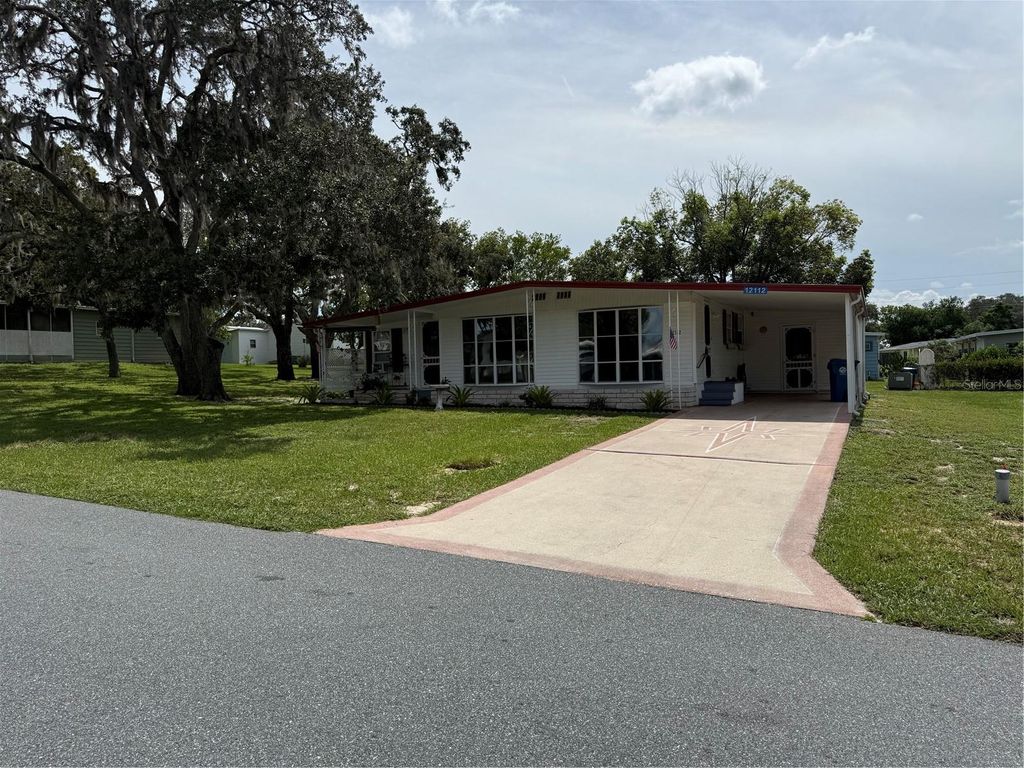 Photo of 12112 Sara Street, Brooksville, FL 34613 (MLS # TB8423466)