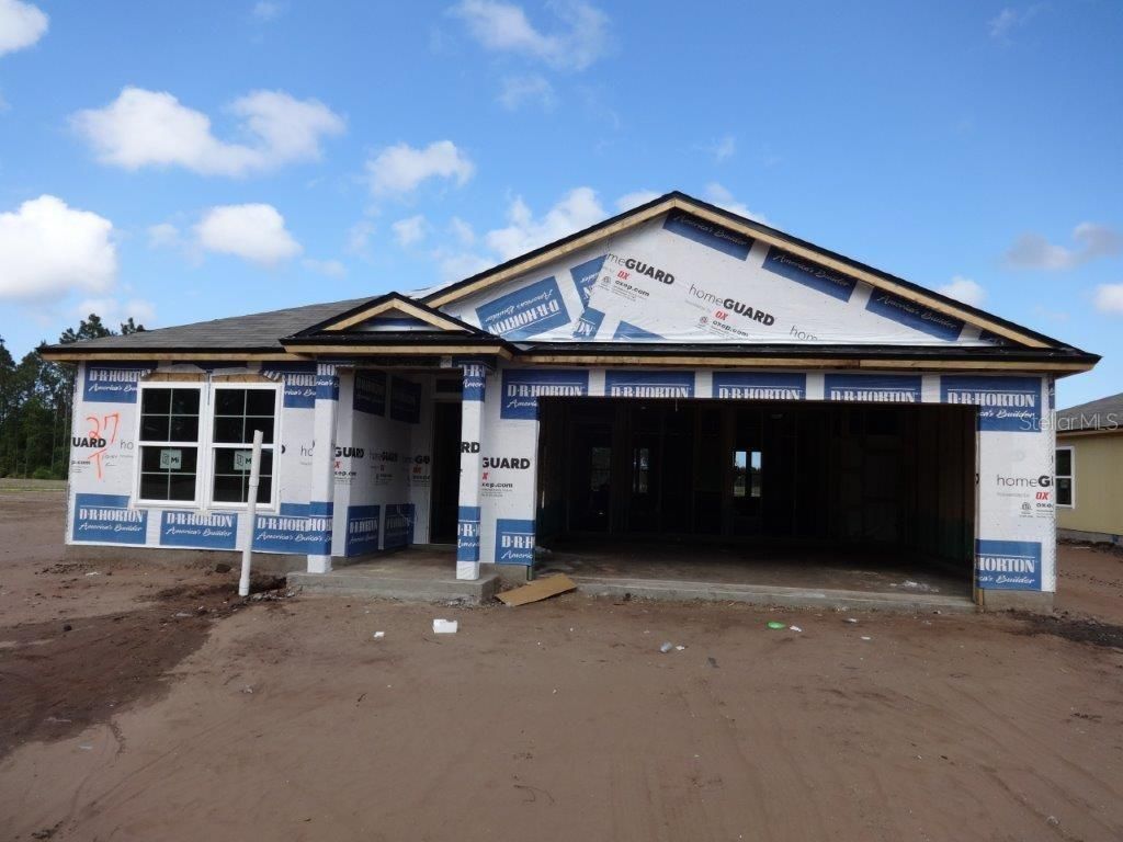 Photo of 40 SUMMERWOOD ROAD S, PALM COAST, FL 32137 (MLS # FC290729)