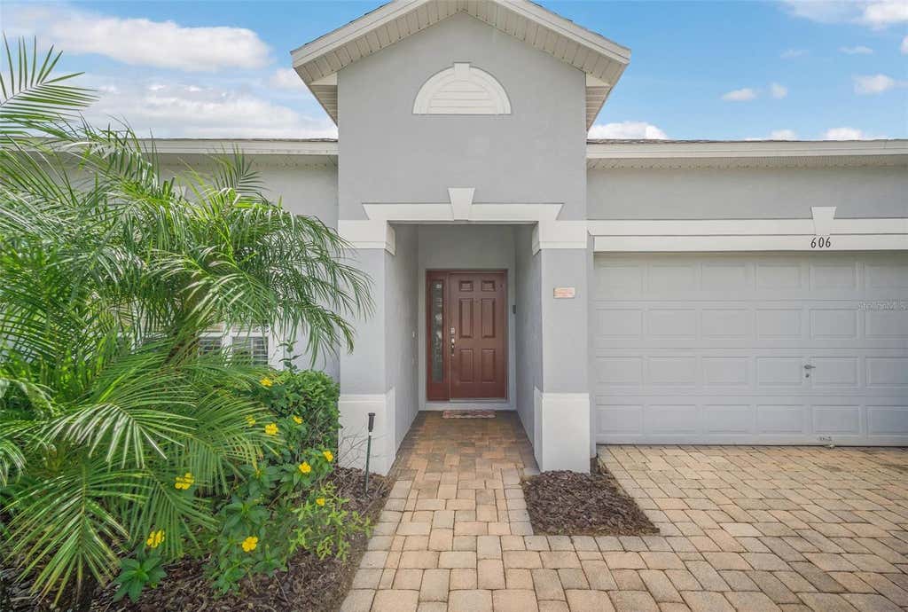 Photo of 606 Balmoral Drive, Davenport, FL 33896 (MLS # O6415464)