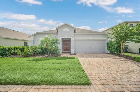 Photo of 606 Balmoral Drive, Davenport, FL 33896 (MLS # O6415464)