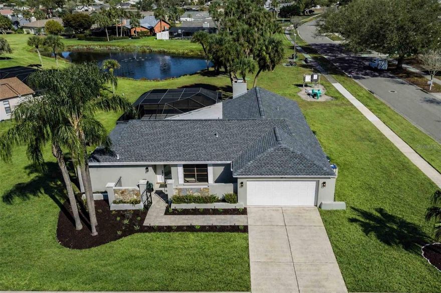 One or more photo(s) has been virtually staged. Dream Gulf Gate 3/2 pool home on oversized corner lot w/sunset lake views from the lanai! New 2025 shingle roof w/transferable GAF warranty, new kitchen cabinets + quartz, updated baths, fresh paint & new lighting. Sidewalks, near shopping. Siesta Key & Legacy Trail.