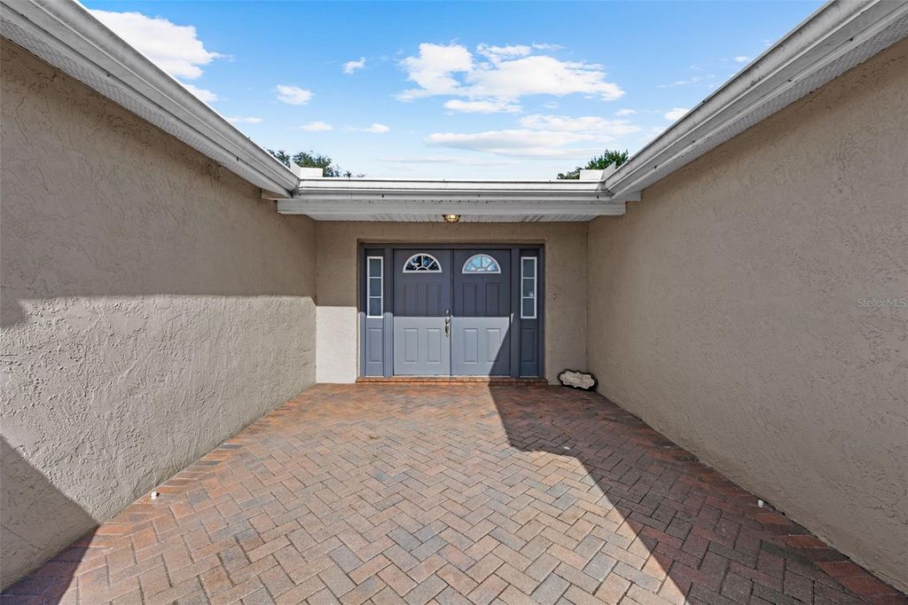 Photo of 8615 Newton Drive, Port Richey, FL 34668 (MLS # TB8463704)