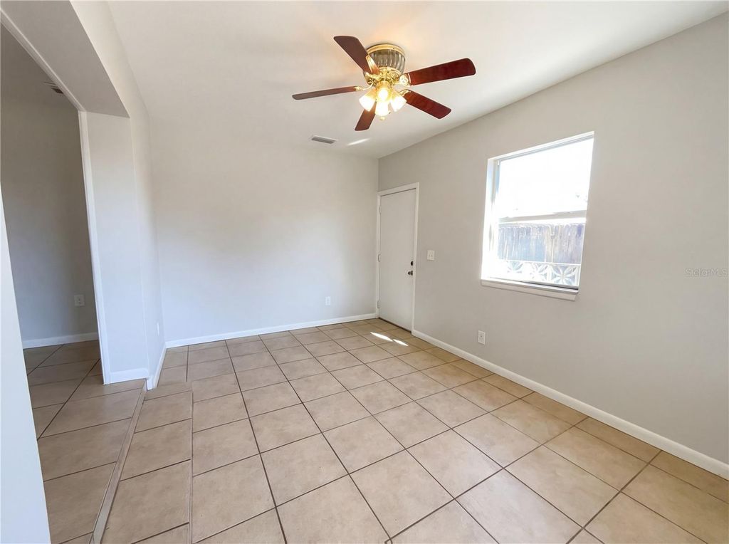 Photo of 4907 Kipp Place, Orlando, FL 32808 (MLS # O6380994)