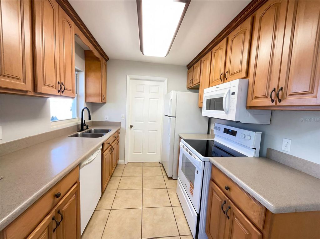 Photo of 4907 Kipp Place, Orlando, FL 32808 (MLS # O6380994)