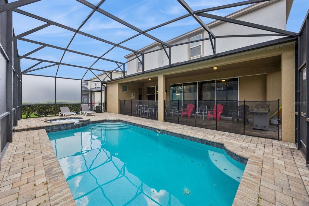 Photo of 9008 Sunshine Ridge Loop, Kissimmee, FL 34747 (MLS # O6396158)