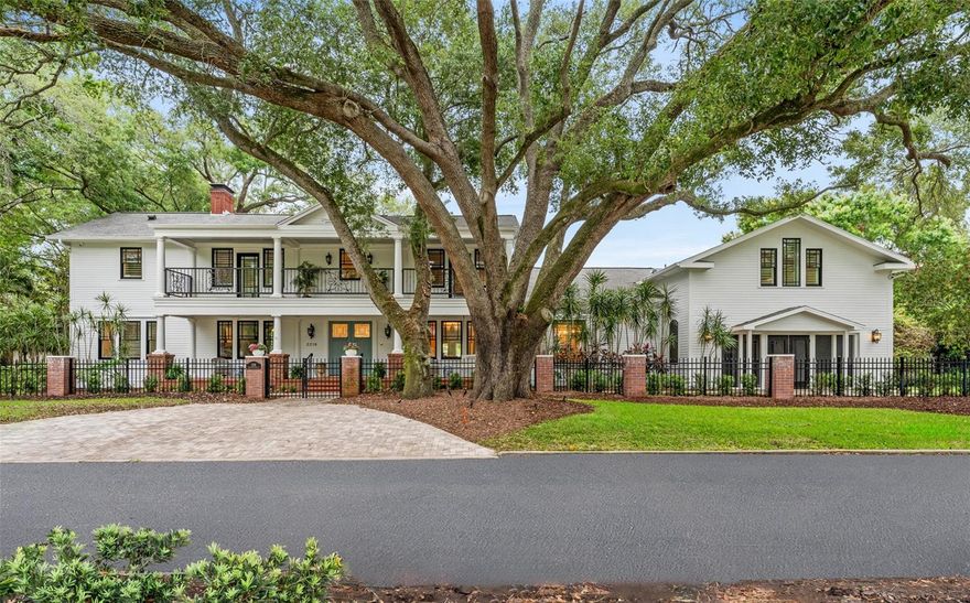 One or more photo(s) has been virtually staged. Welcome to your dream home overlooking Palma Ceia golf course! This luxurious estate offers an expansive acre lot surrounded by lush landscaping, providing unparalleled privacy and serenity. Built with all the charm in 1924, but taken down to the studs and completely renovated from 2007-2009.

Step inside to discover the epitome of luxury living: 
Expansive grounds that are perfect for outdoor activities and entertaining with manicured lawns and mature trees. Relax in style by the resort sized pool complete with detached the pool house studio. Store all your vehicles and toys in the spacious four-car garage, ensuring ample space for your automotive needs. Immerse yourself in the ultimate cinematic experience with your own private home theatre, perfect for movie nights or entertaining guests. Stay fit and healthy with a state-of-the-art gym featuring a private entry, allowing for convenient access for friends to join your workout session. After your workout and also located inside the gym, indulge in relaxation in your oversized personal sauna. The outdoor space is the perfect layout for entertaining with a huge party cabana overlooking the pool that features the second outdoor kitchen on the property, a swim up bar with seating, a fireplace and room for dining. The home comes with a Core4 whole house smart integration system already wired to help control every aspect of your home with ease. The main space of the home is light and airy with multiple flexible areas that could be used to house an office, sitting room, playroom- whatever your needs! The primary bedroom and 3 other bedrooms upstairs all have walk-in closets and ensuite bathrooms. There is another large bedroom off the kitchen by the theatre that has an attached full bathroom as well. The possibilities are endless in this home! 

Don't miss out on the opportunity to own this one-of-a-kind, exquisite property in one of Tampa's most coveted neighborhoods. Schedule your private showing today.