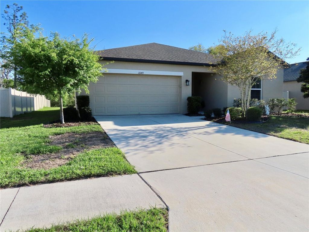 Photo of 13149 Conquistador Loop, Spring Hill, FL 34610 (MLS # TB8490740)