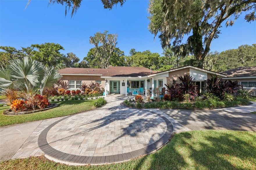 Welcome to this stunning waterfront home in the highly desirable Palmora Park, one of Leesburg’s most established and sought-after neighborhoods. This spacious 3,000+ sq ft lakefront property offers direct access to the Lake Harris Chain of Lakes, making it ideal for anyone seeking a true Florida boating lifestyle. Enjoy your own private screened-in dock with electricity, water, mini-fridge, and boat lift. This dock is perfect for sunset views, fishing, and relaxing on the water.

Inside this beautiful professionally renovated 1949 home, over 3,200 sqft blend vintage character with modern comfort. This home features a split floor plan, multiple living areas, and an expansive screened patio overlooking the lagoon. The main-floor primary suite offers a wheelchair-accessible bathroom and a unique hidden walk-in closet tucked behind a mirrored door. Upstairs, a large secondary master suite provides outstanding space for guests or multigenerational living—a highly sought-after feature for today’s buyers.

The gourmet kitchen offers ample storage, dedicated instant hot water faucet, smart fridge and much more. The kitchen has a huge eat in dining area and easy access to living spaces. Large windows bring in natural light and capture peaceful water views throughout the home. Outside, the private backyard flows gently to the water’s edge, creating an ideal indoor-outdoor living experience.

Located in a golf cart–friendly community with neighborhood parks and quick access to downtown Leesburg, this home combines luxury, lifestyle, and location. Rarely does a waterfront property in Palmora Park with this much character and square footage become available.

The seller has put a lot of thought into this property to make it not only move in ready for the next owners but to make it, so they don't need to worry for years to come. Example is when getting a new AC earlier this year they had all ducts cleaned and sealed throughout the whole house and added a UV Light for cleaner air. They also just installed a brand-new roof with top-of-the-line shingles with a 15-year warranty and maintenance package where Eustis Roofing will clean and maintain the roof for 15 years so the roof will last even longer. 


This home is designed for you to enjoy your life on the water while also providing plenty of storage from the kitchen cabinets, loads of closets, 2 car garage, long driveway and an oversize shed that was lifted and rebuilt in 2024. This shed is a great workshop as it has electricity and a waterspout outside. The shed is also insulated and ready for whatever the next owner wants to store or work on!! 

All of this in Leesburg’s most beloved, golf-cart-friendly neighborhood just steps from downtown shops, dining, and festivals, with no HOA. A new roof (Oct 2025), new AC (April 2025), and professional renovations (2021/2022) make this rare Palmora Park treasure move-in ready for its next chapter.