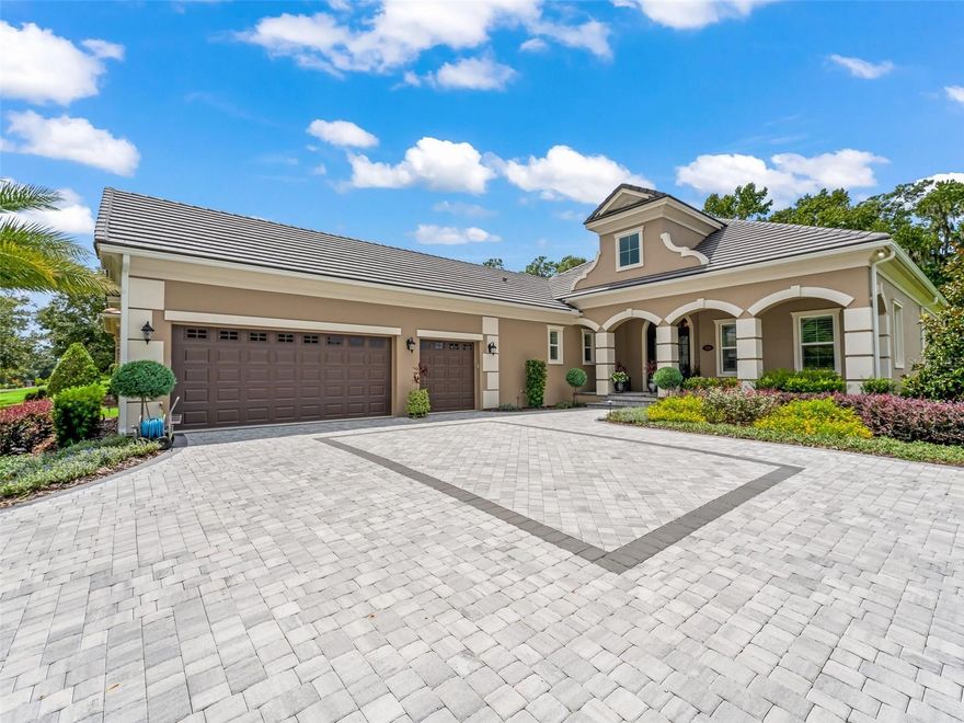 This immaculate 2021 home is virtually ready for occupancy.  Constructed by well known Luetgert Builders, it is located in Brittany Estates on the third tee box inside the gates of Golden Ocala Golf & Equestrian Club. By golf cart or automobile, residents are 3 to 5 minutes from the many country club facilities and the back gate of the World Equestrian Center. What could make this better? The price has been reduced to make it possibly the best real estate deal inside the gates.  There are upgrades galore throughout the three bedroom, 3 and ½ bath and large three car garage home. The luxurious master suite has a sitting area, massive glass shower, two private toilets, large mirrors and upgraded lighting.  The two additional ensuite bedrooms are exactly what is needed for family or company. The open floor plan has everything you will want or need for comfortable, easy living with spacious kitchen, living room and dining areas.  There is a room now used as an office that could be the perfect studio or guest room. There are two fireplaces, one in and one out, hickory wood floors, custom made iron front doors, and a very large U-shaped paver driveway with double entry and exit.  Energy features abound with extra installation throughout, water softener, double air conditioning and heating units, double tankless water heaters, epoxy garage floors, and a back up generator providing peace of mind and protection at all times.  An extra large screened in rear patio has a kitchen and fireplace with a view of a dedicated common area on the championship golf course. This home is almost totally turnkey with very few exceptions.
